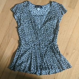 Wrap top with a flower pattern all over it.